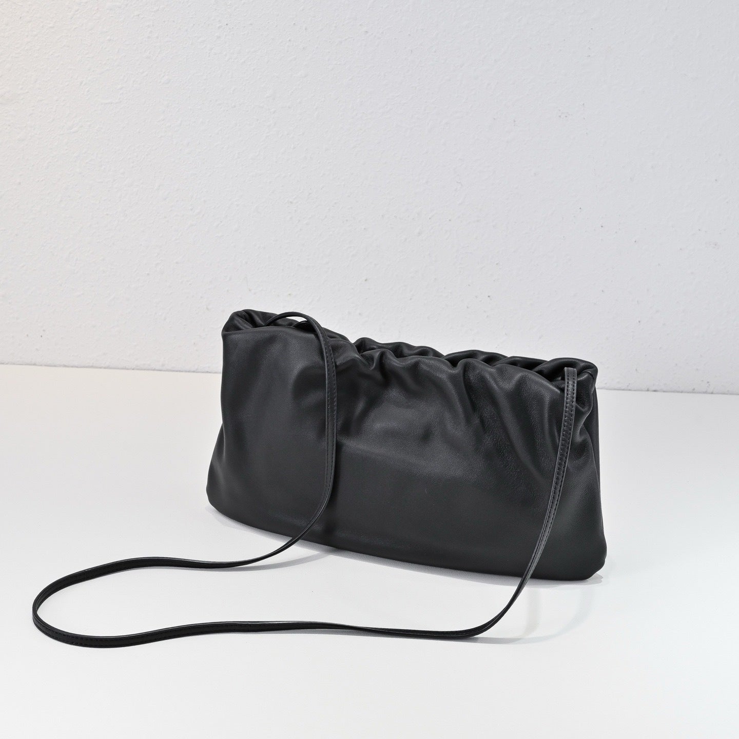 Gathered leather shoulder / crossbody bag